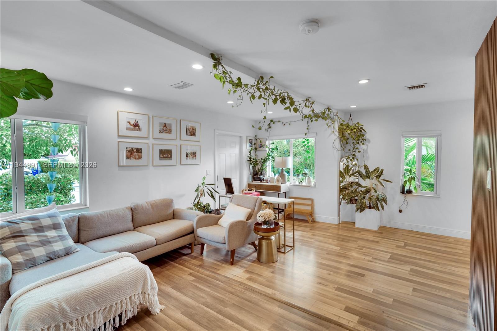 1450 Southwest 20th Avenue Miami, FL 33145 - Photo 11 of 44 a living room with furniture and a large window