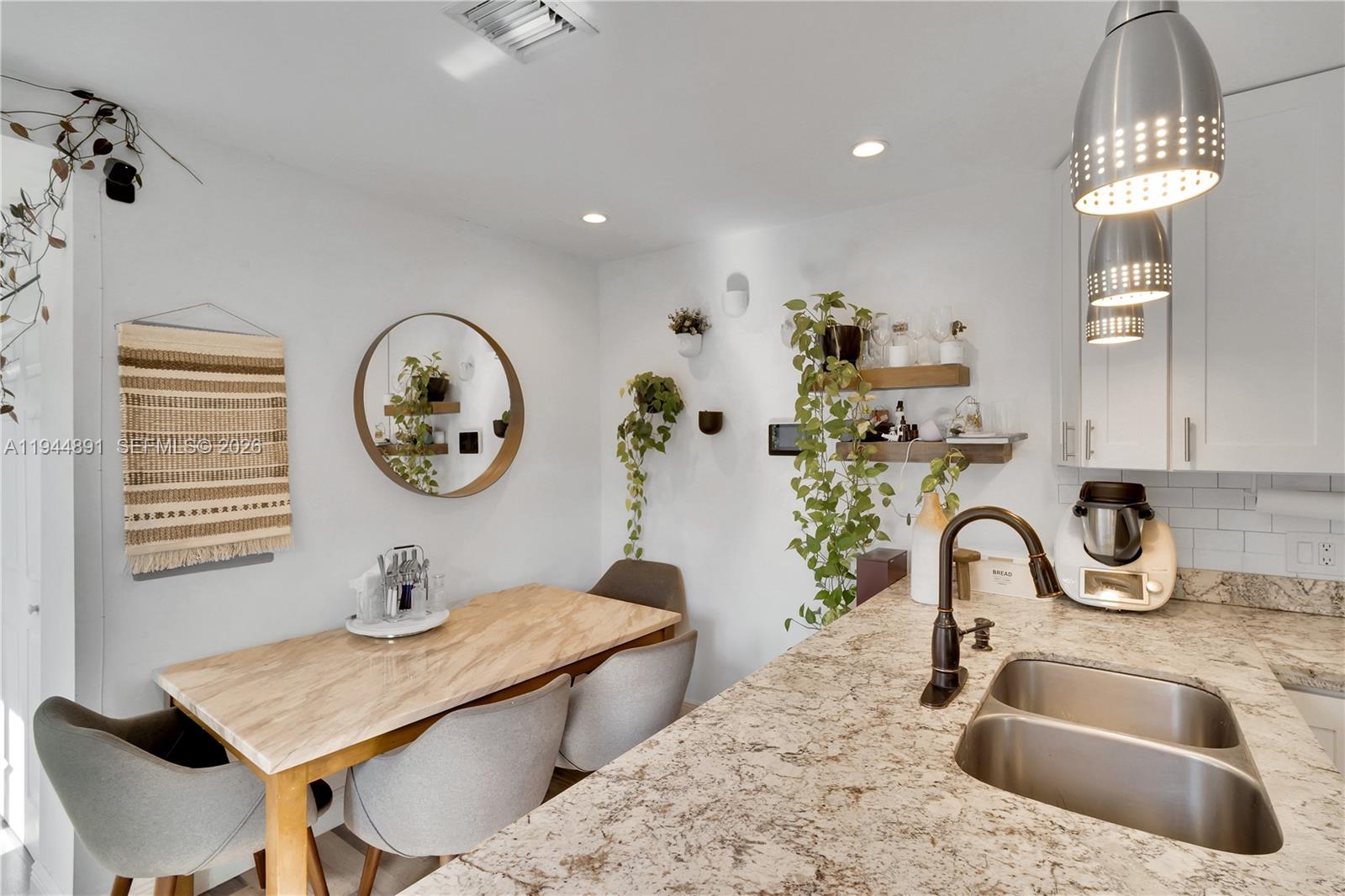 1450 Southwest 20th Avenue Miami, FL 33145 - Photo 15 of 44 a bathroom with a sink and a mirror