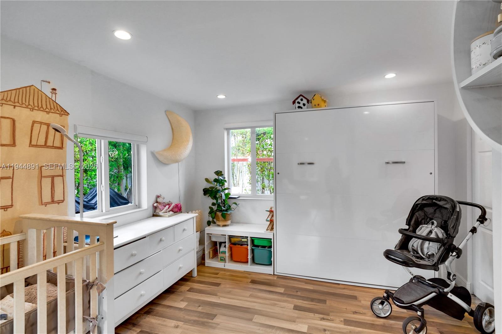 1450 Southwest 20th Avenue Miami, FL 33145 - Photo 17 of 44 a room with furniture and window