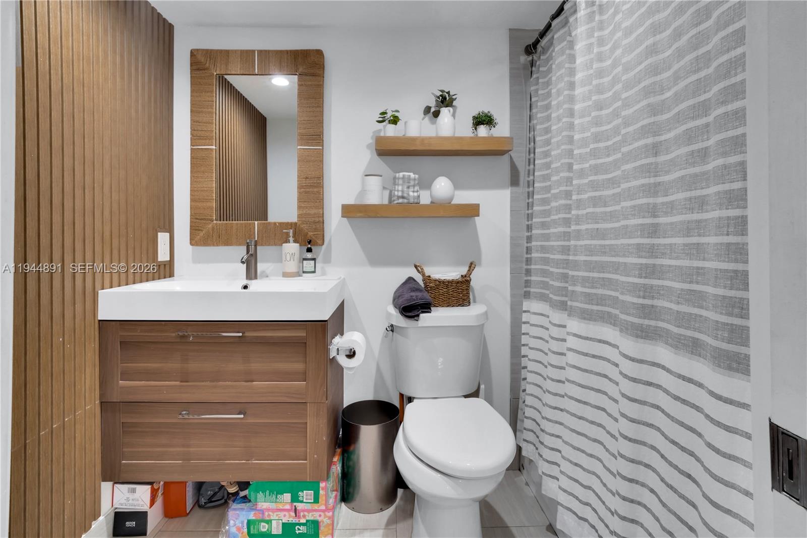 1450 Southwest 20th Avenue Miami, FL 33145 - Photo 20 of 44 a bathroom with a sink and a toilet