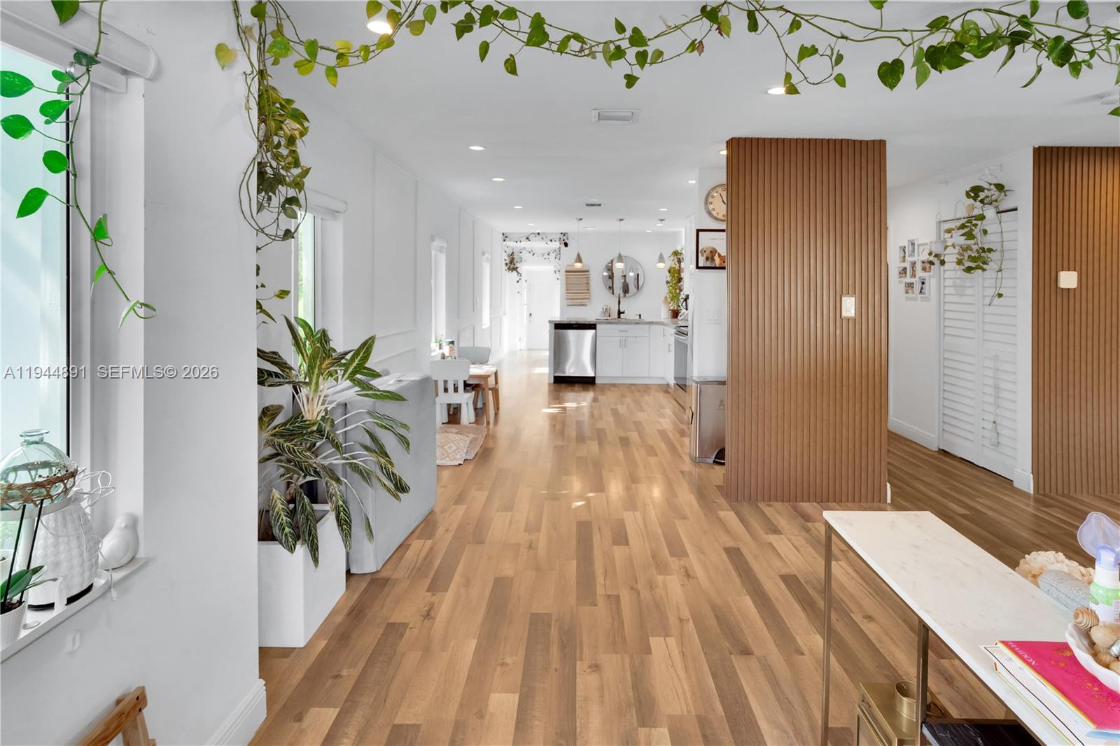 1450 Southwest 20th Avenue Miami, FL 33145 - Photo 8 of 44 wooden floor with a potted plant