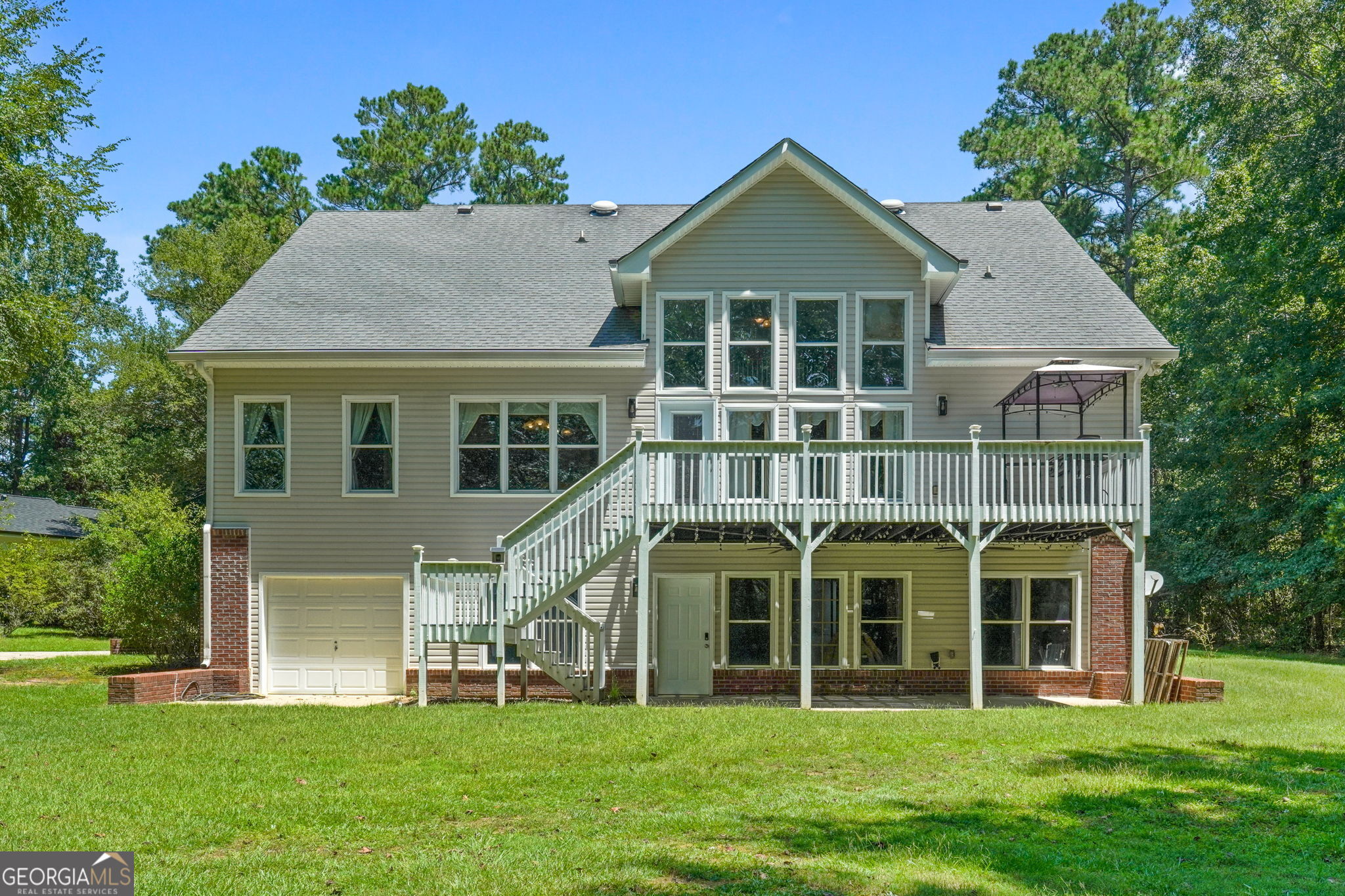 330 James Moore Circle Jackson, GA 30233 - Photo 24 of 31 a front view of a house with a yard