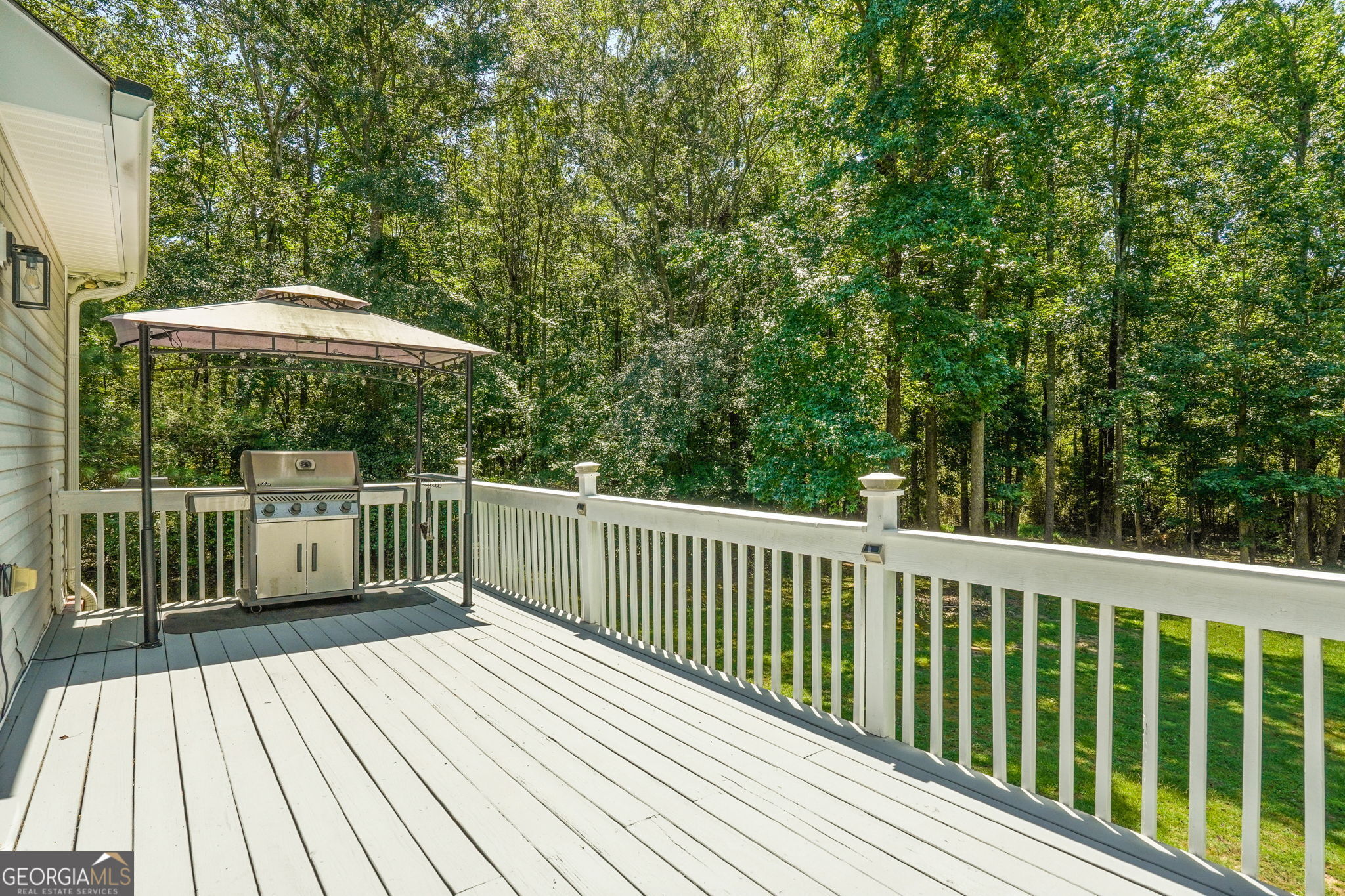 330 James Moore Circle Jackson, GA 30233 - Photo 25 of 31 a view of balcony with wooden floor and fence