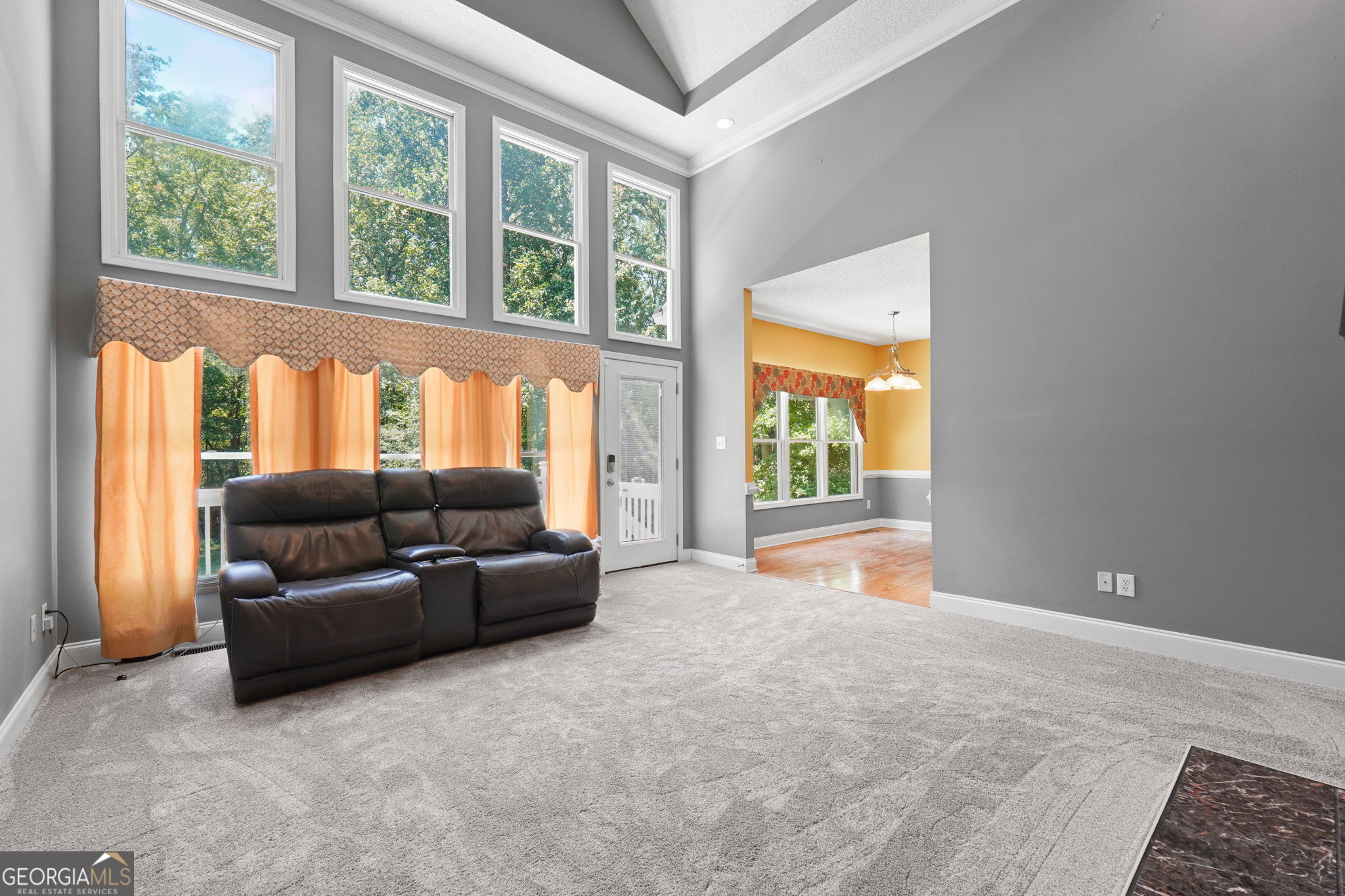 330 James Moore Circle Jackson, GA 30233 - Photo 3 of 31 a living room with furniture and a large window