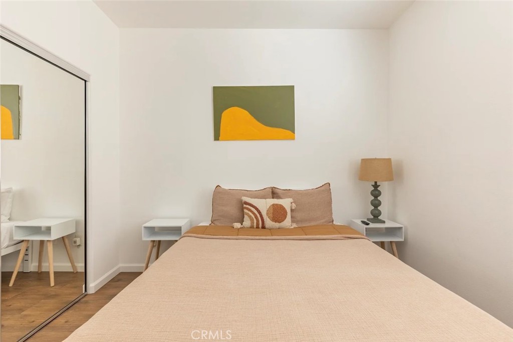 50157 Calle Tolosa Coachella, CA 92236 - Photo 15 of 24 a bedroom with a bed and a chair