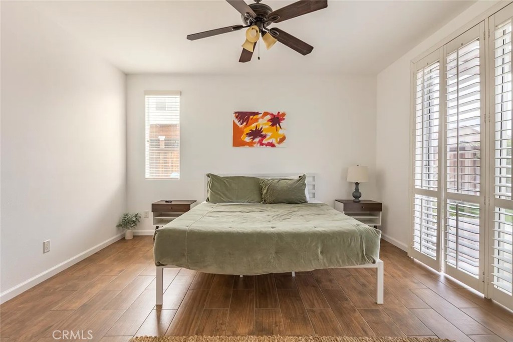 50157 Calle Tolosa Coachella, CA 92236 - Photo 10 of 24 a bed sitting in a bedroom next to a window