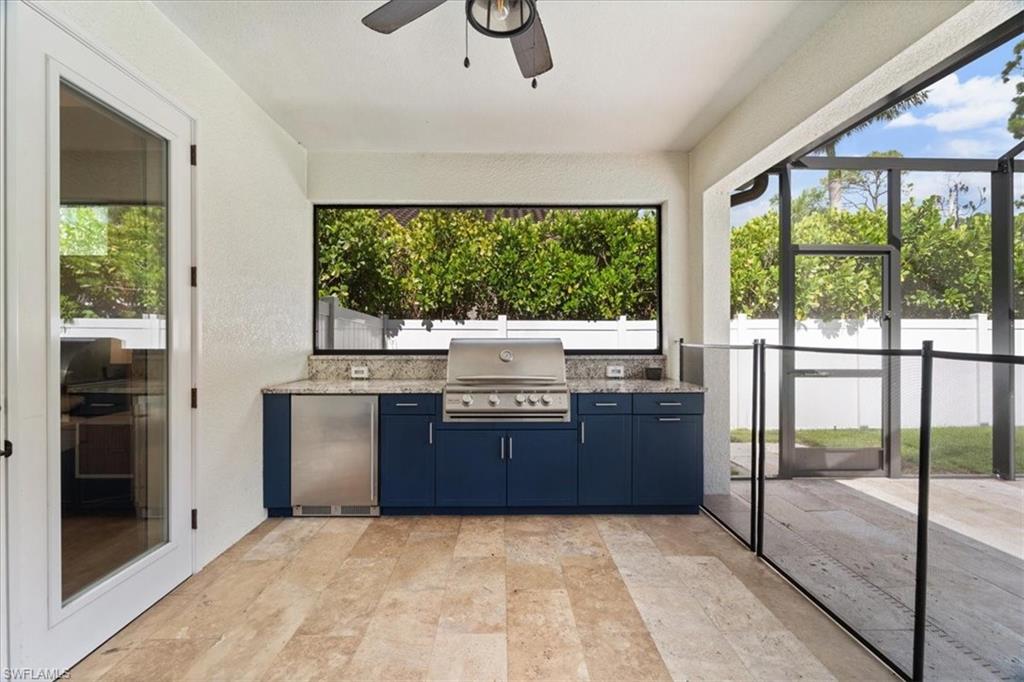 3554 McComb Lane Bonita Springs, FL 34134 - Photo 19 of 25 a room with a large window