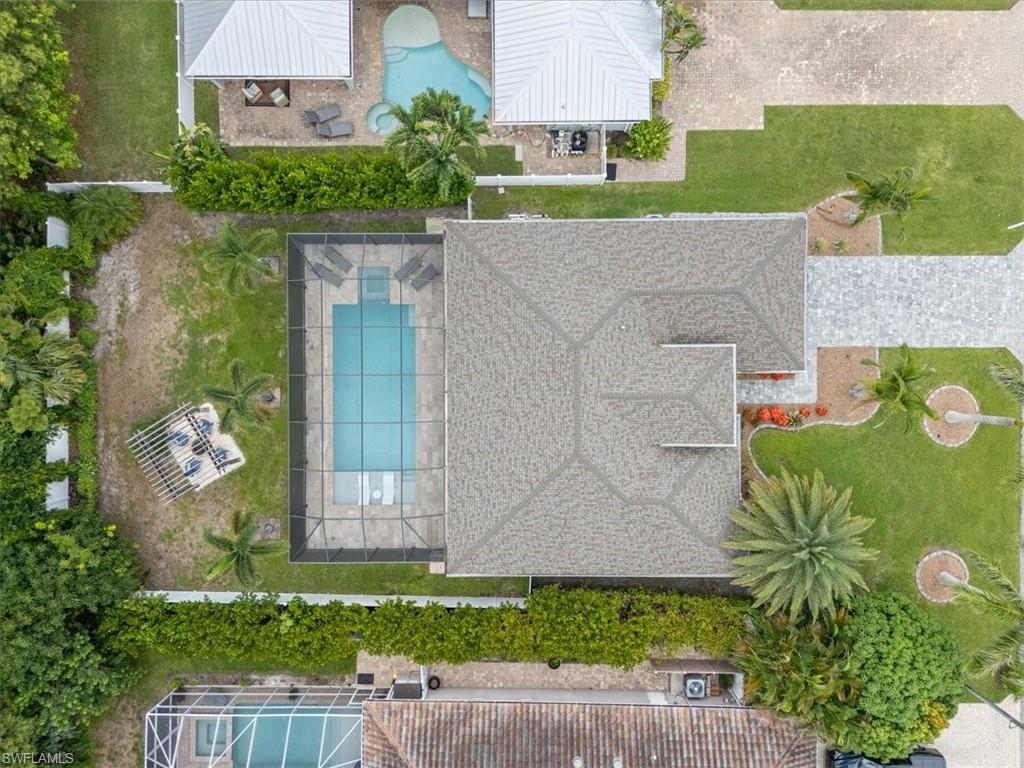 3554 McComb Lane Bonita Springs, FL 34134 - Photo 25 of 25 front view of a house with a yard