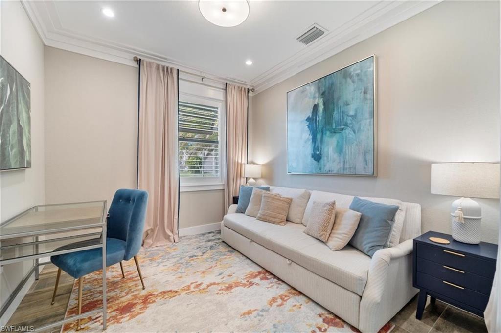 3554 McComb Lane Bonita Springs, FL 34134 - Photo 5 of 25 a living room with furniture and a window