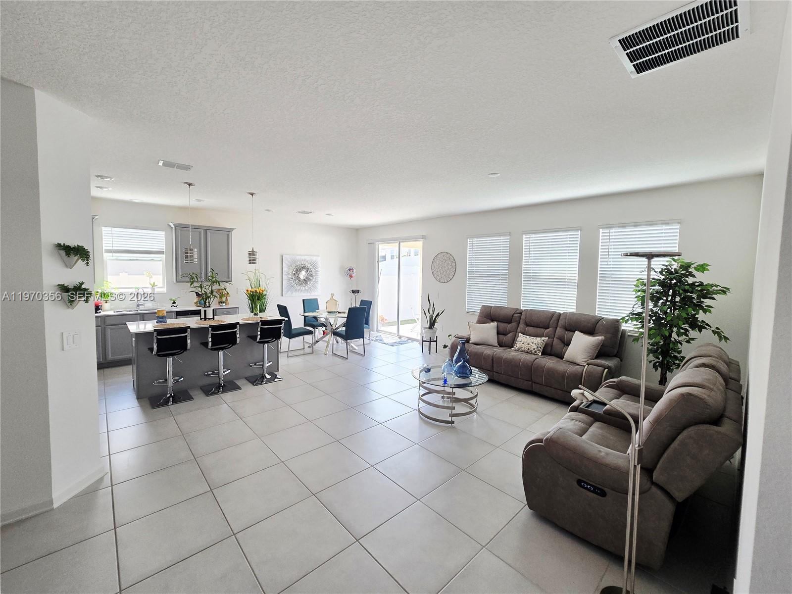 815 Kapi Drive Groveland, FL 34736 - Photo 19 of 30 a living room with furniture