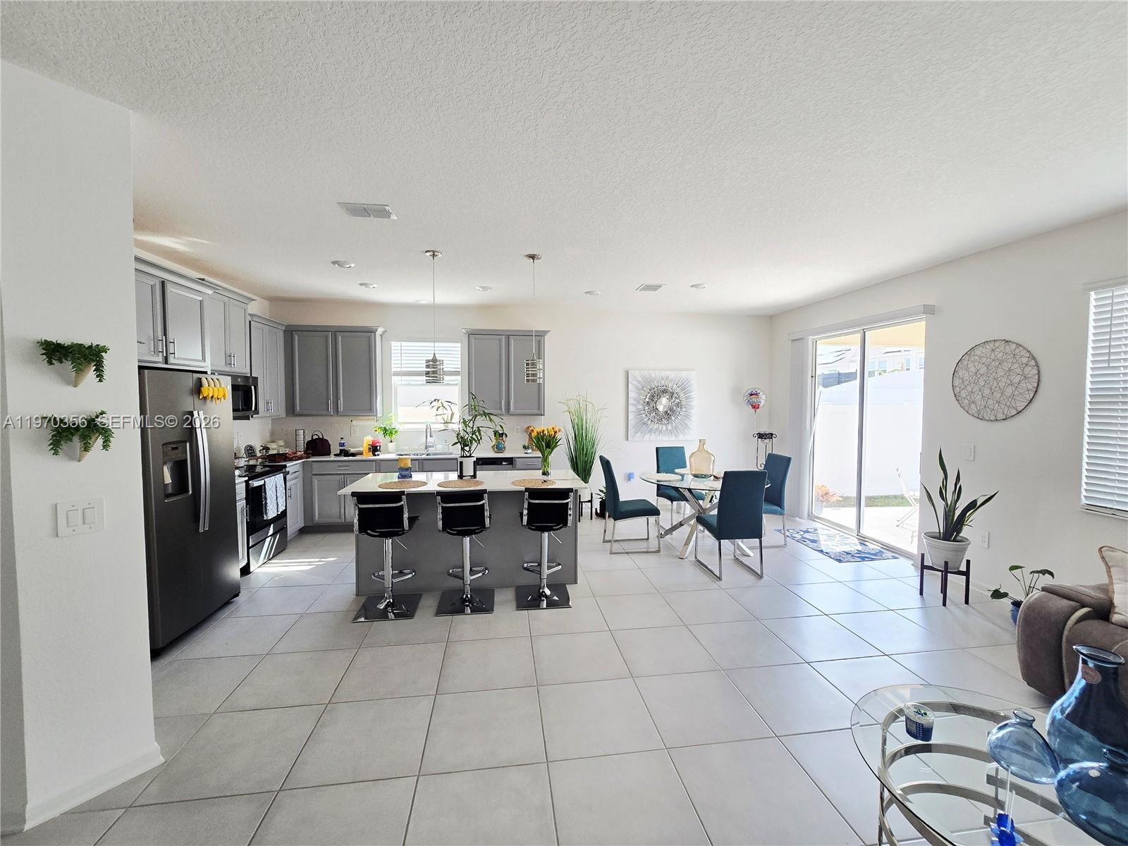 815 Kapi Drive Groveland, FL 34736 - Photo 20 of 30 a view of a dining room kitchen and a window