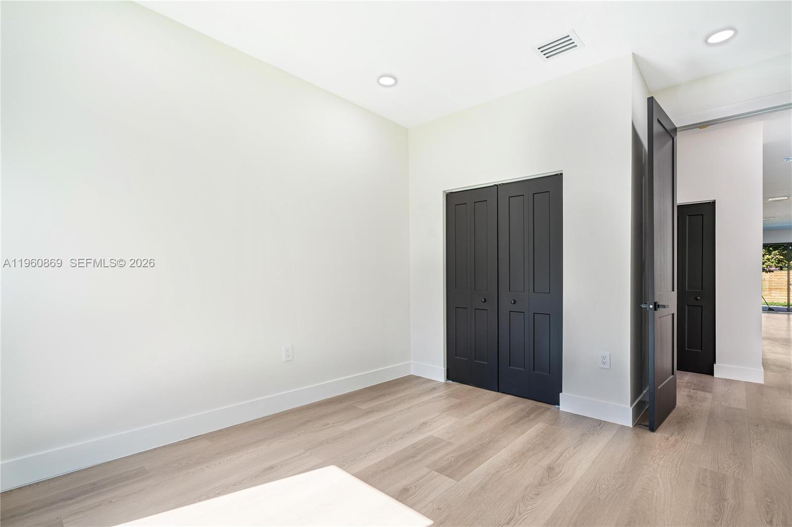 281 Northwest 52nd Street, Unit 281 Miami, FL 33127 - Photo 26 of 52 a view of an empty room