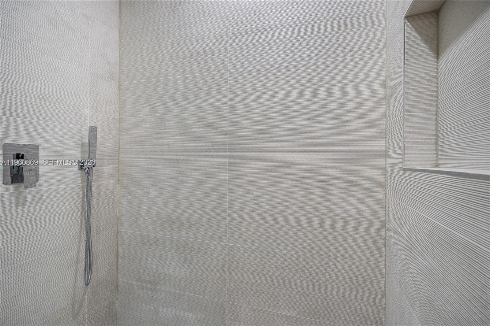 281 Northwest 52nd Street, Unit 281 Miami, FL 33127 - Photo 51 of 52 a bathroom with a shower