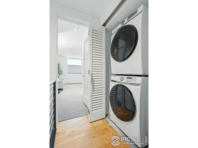 a close view of a utility room with washer and dryer