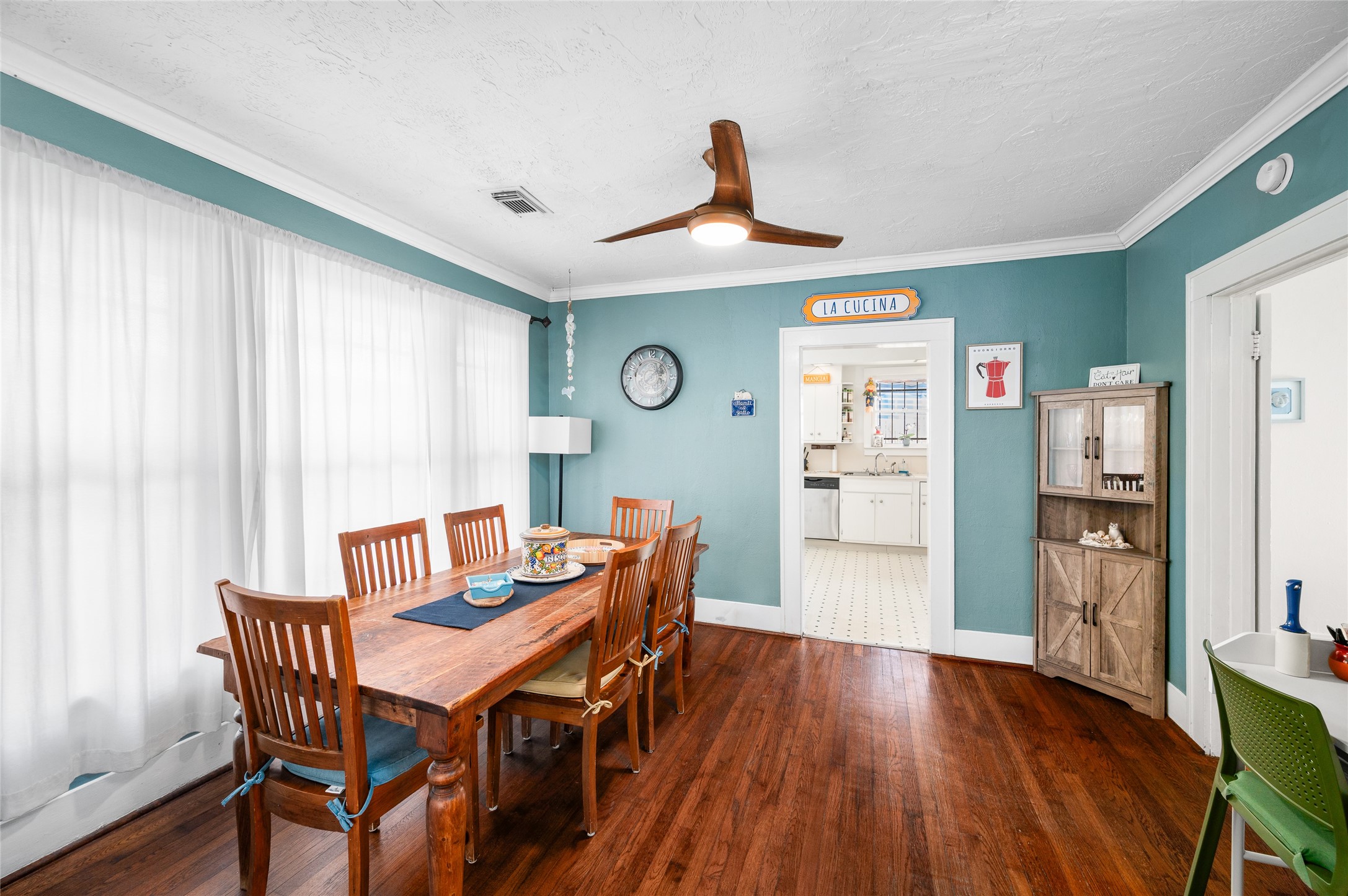 2503 Park Street Houston, TX 77098 - Photo 4 of 23 a view of a dining room with furniture window and wooden floor