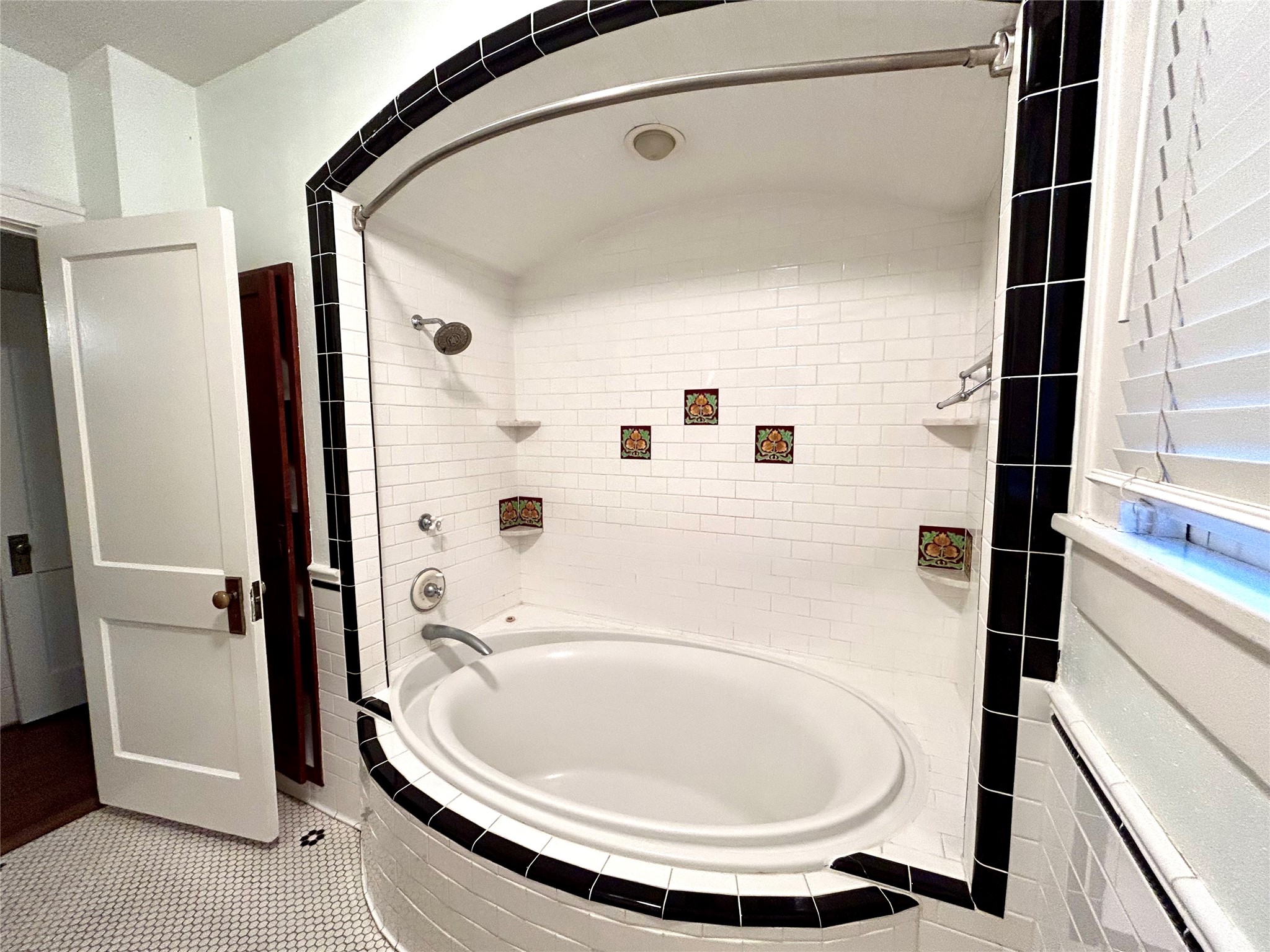 2503 Park Street Houston, TX 77098 - Photo 5 of 23 a bathroom with a sink and a mirror