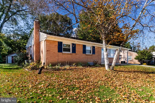 a view of a backyard of the house