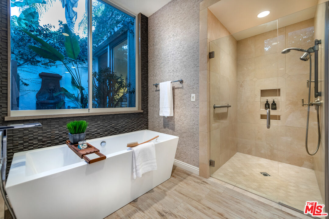 4500 Park Serena Calabasas, CA 91302 - Photo 19 of 34 a bathroom with a tub sink and shower