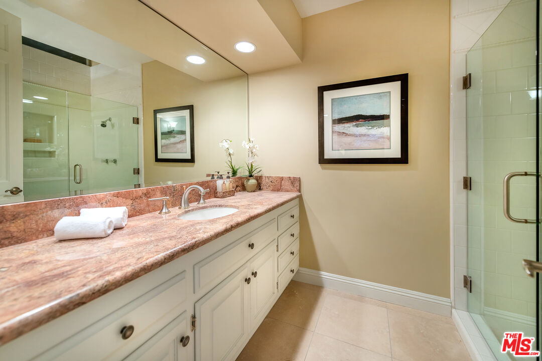 4500 Park Serena Calabasas, CA 91302 - Photo 28 of 34 a bathroom with a granite countertop sink mirror and double