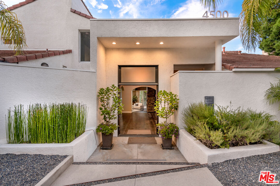 4500 Park Serena Calabasas, CA 91302 - Photo 3 of 34 a front view of a house with garden