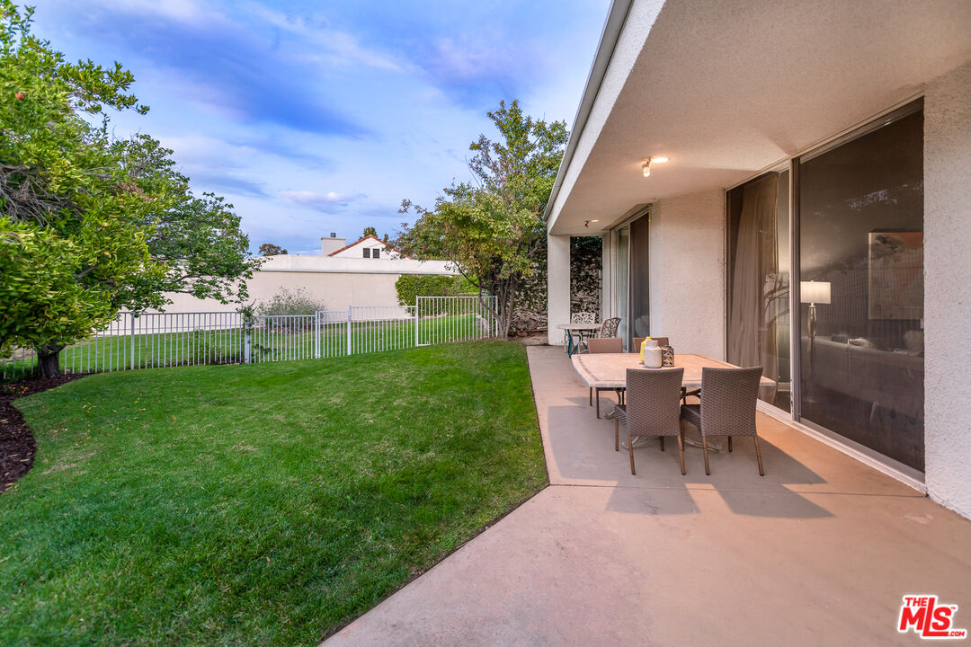 4500 Park Serena Calabasas, CA 91302 - Photo 31 of 34 a view of a house with backyard sitting area and garden