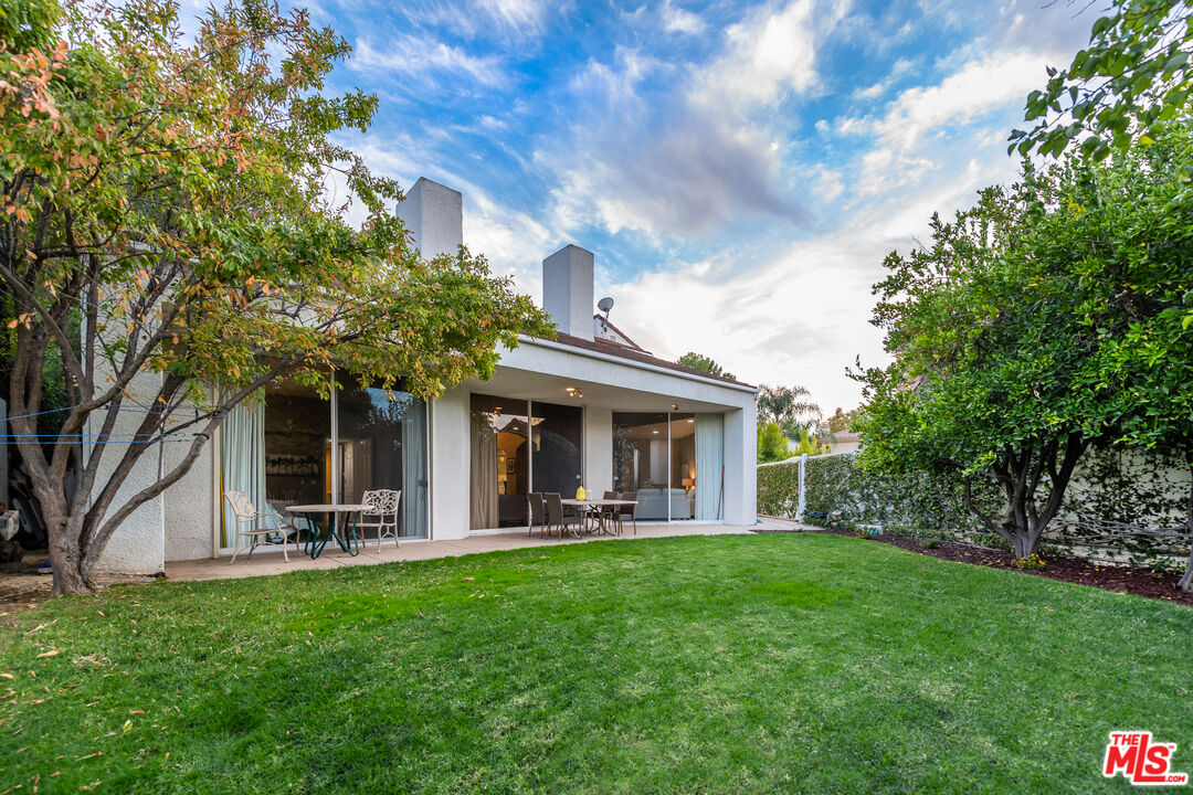 4500 Park Serena Calabasas, CA 91302 - Photo 32 of 34 a view of a house with a yard and a large tree