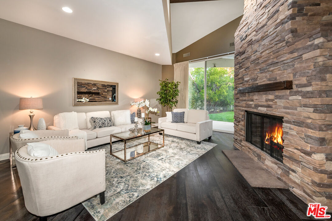 4500 Park Serena Calabasas, CA 91302 - Photo 8 of 34 a living room with furniture and a fireplace