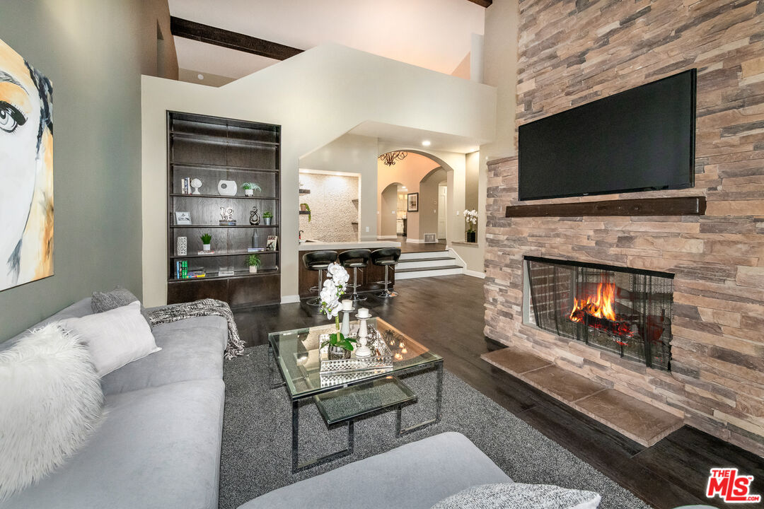 4500 Park Serena Calabasas, CA 91302 - Photo 10 of 34 a living room with furniture and a flat screen tv