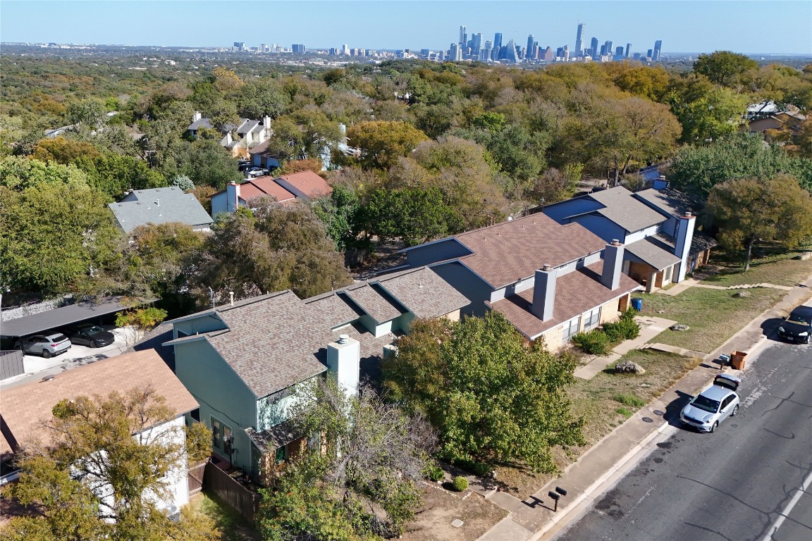 3222 Tamarron Boulevard, Unit A Austin, TX 78746 - Photo 1 of 28 an aerial view of residential houses with outdoor space