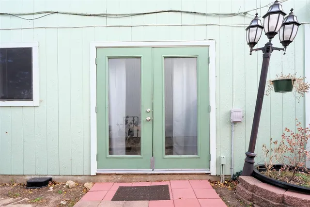 a view of a door and small space