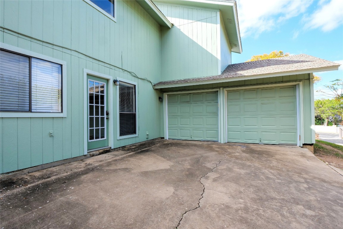 3222 Tamarron Boulevard, Unit A Austin, TX 78746 - Photo 20 of 28 a view of outdoor space and front view of a house