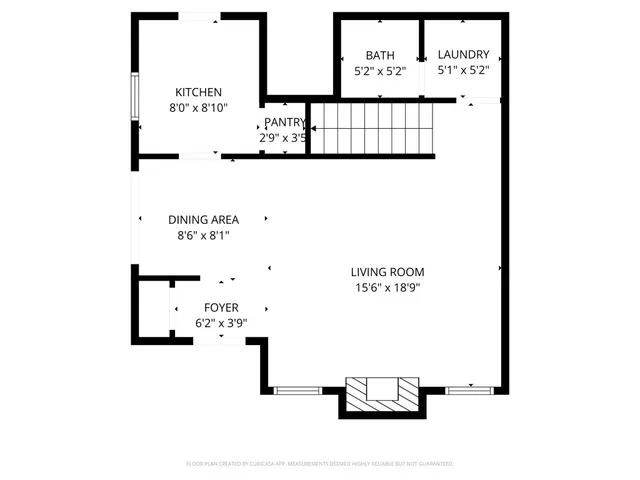 a picture of a bench in front of a wall