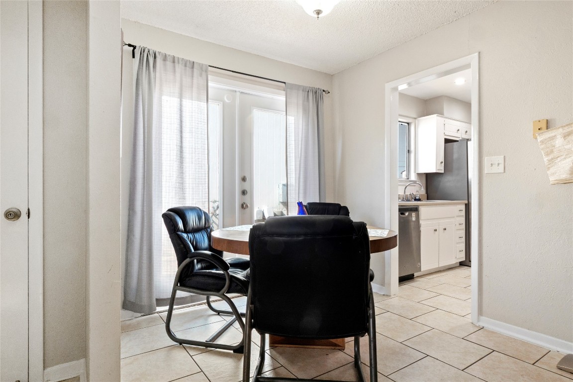 3222 Tamarron Boulevard, Unit A Austin, TX 78746 - Photo 7 of 28 a living room with furniture and a window