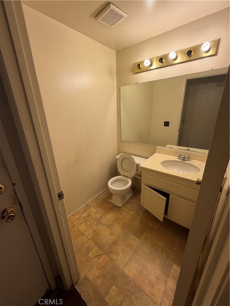 24677 Rugby Lane Moreno Valley, CA 92551 - Photo 32 of 43 Downstairs 1/2 bath