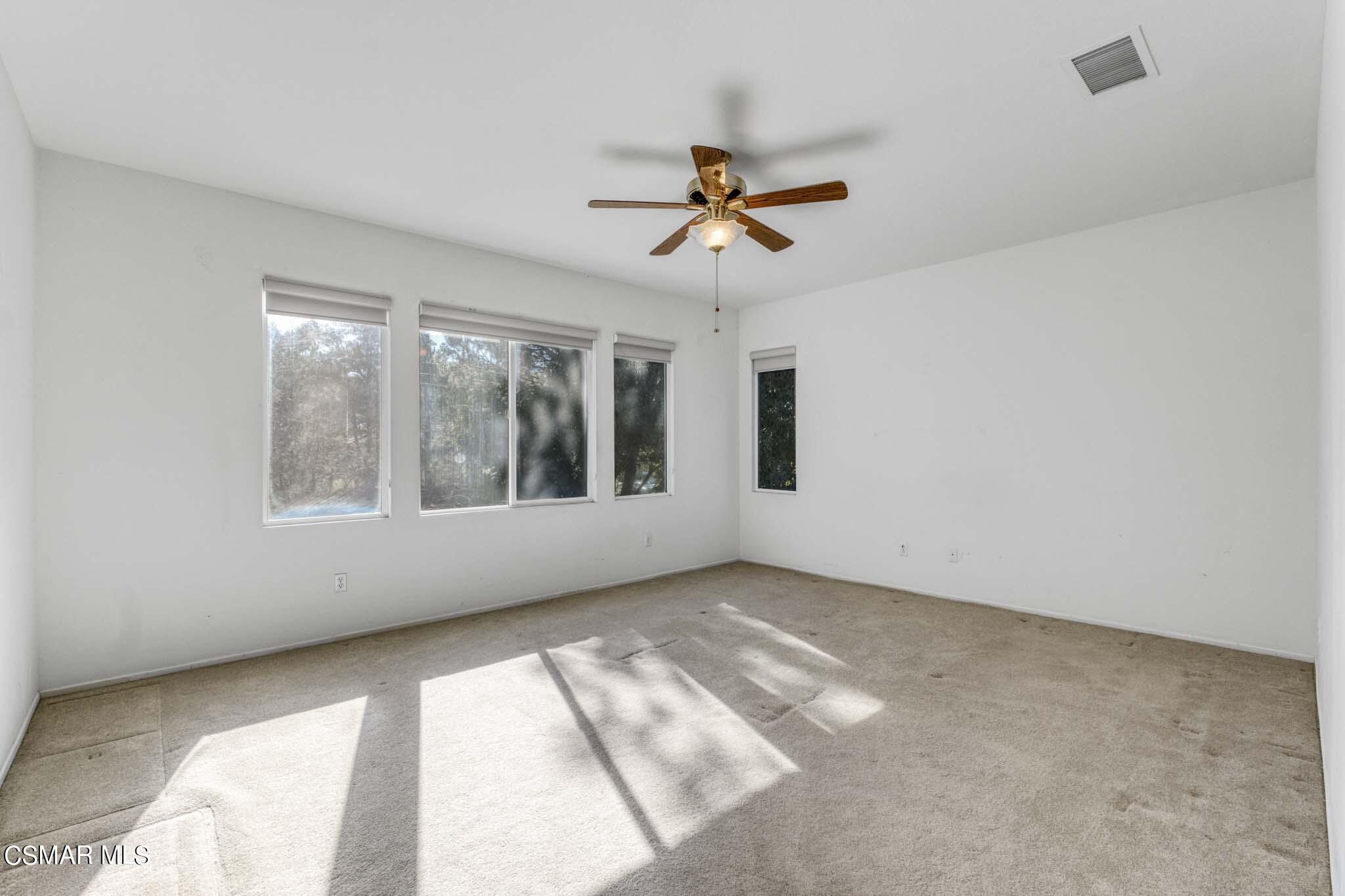 476 Woodland Road Simi Valley, CA 93065 - Photo 22 of 41 a view of an empty room with a window