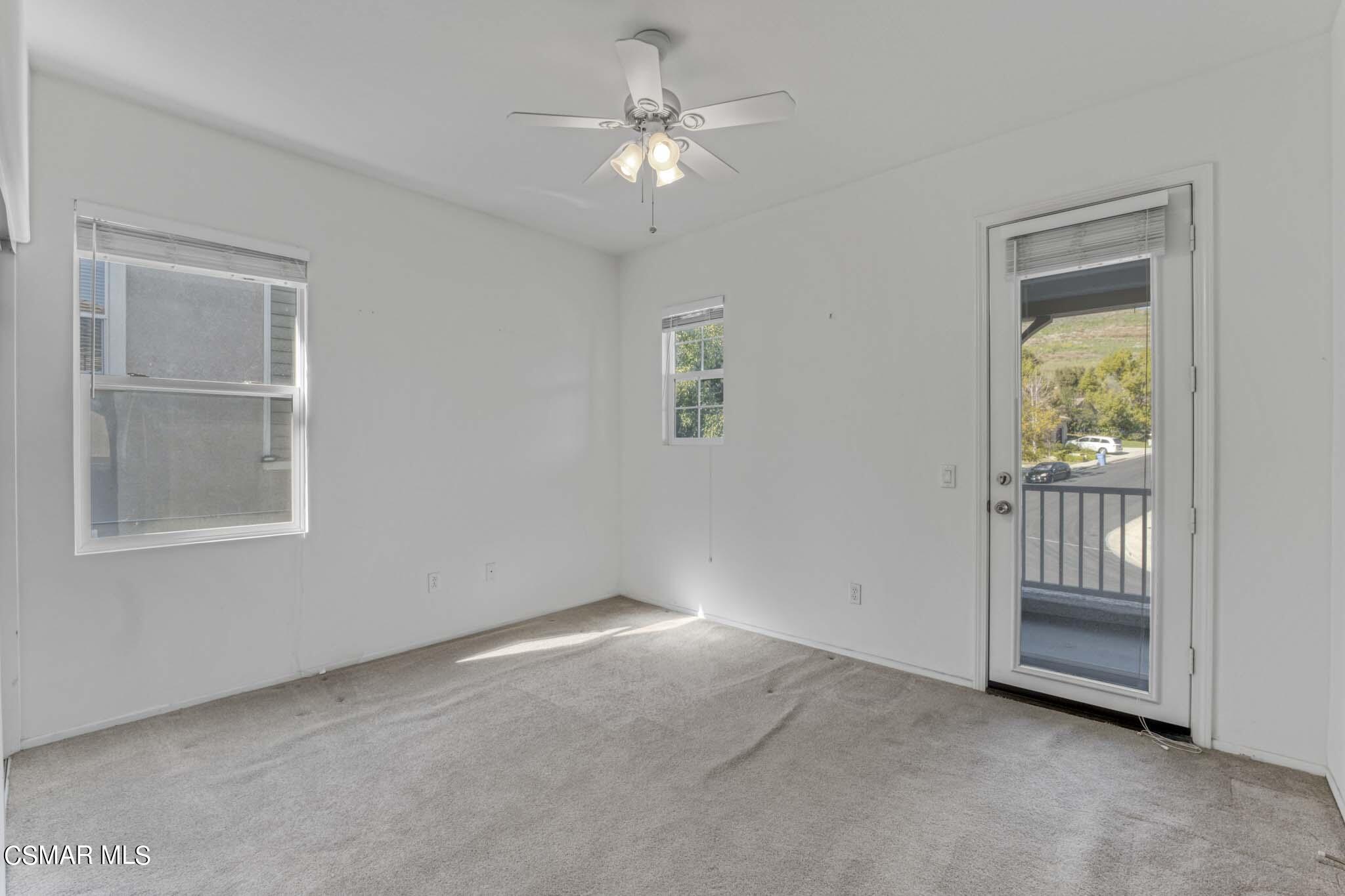 476 Woodland Road Simi Valley, CA 93065 - Photo 28 of 41 an empty room with windows and closet