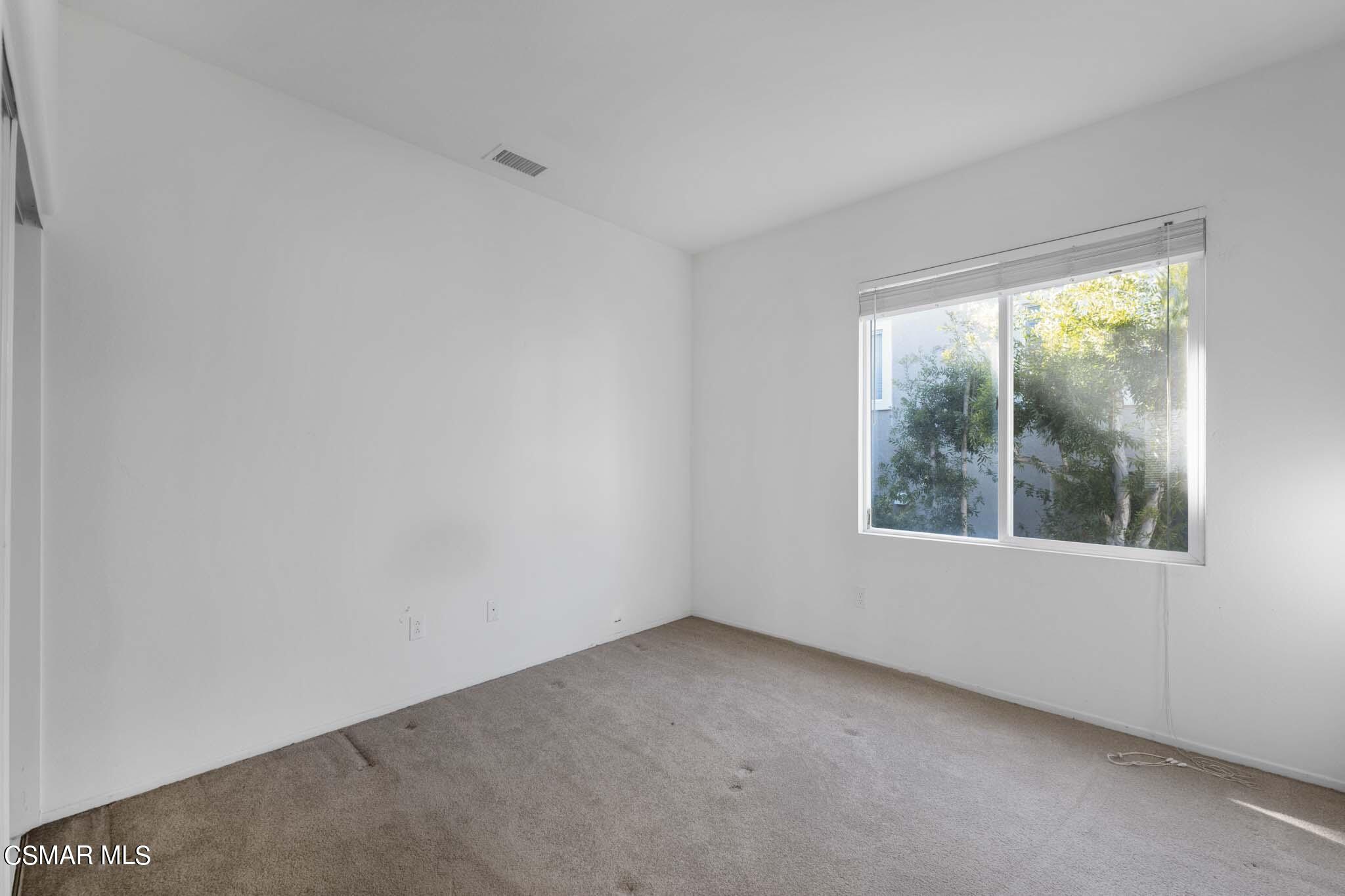 476 Woodland Road Simi Valley, CA 93065 - Photo 34 of 41 an empty room with windows