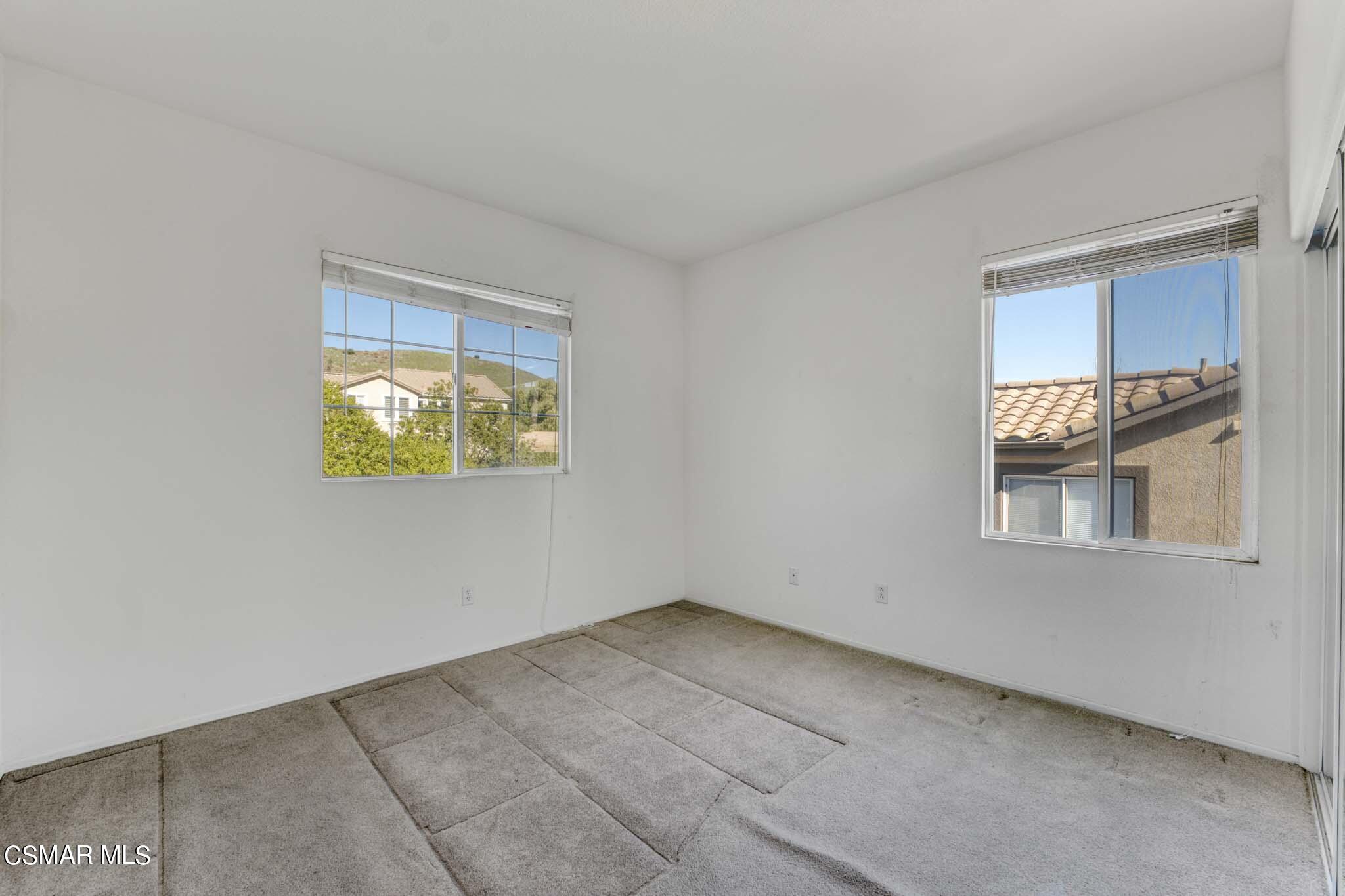 476 Woodland Road Simi Valley, CA 93065 - Photo 36 of 41 an empty room with windows and closet