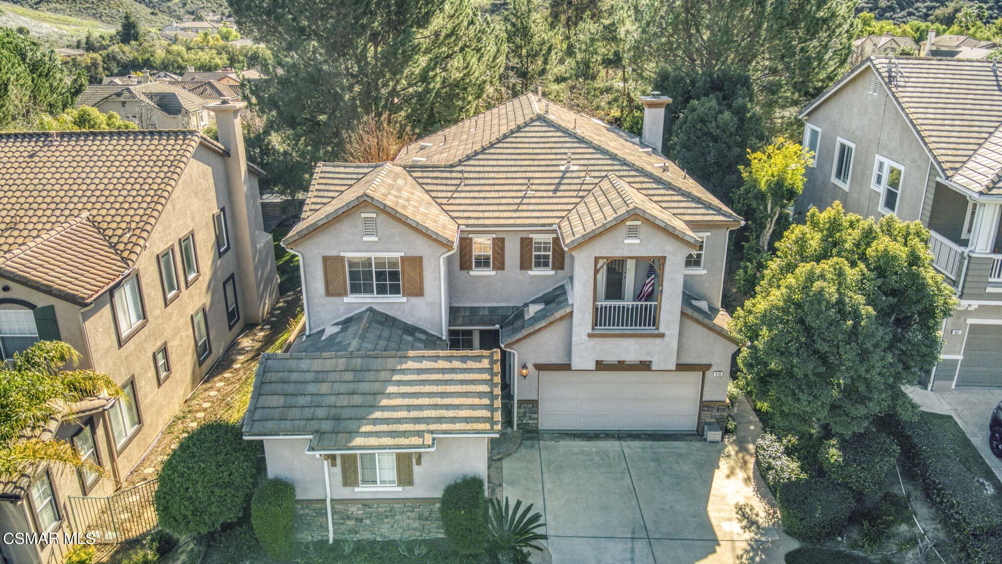 476 Woodland Road Simi Valley, CA 93065 - Photo 5 of 41 a view of a house with a yard