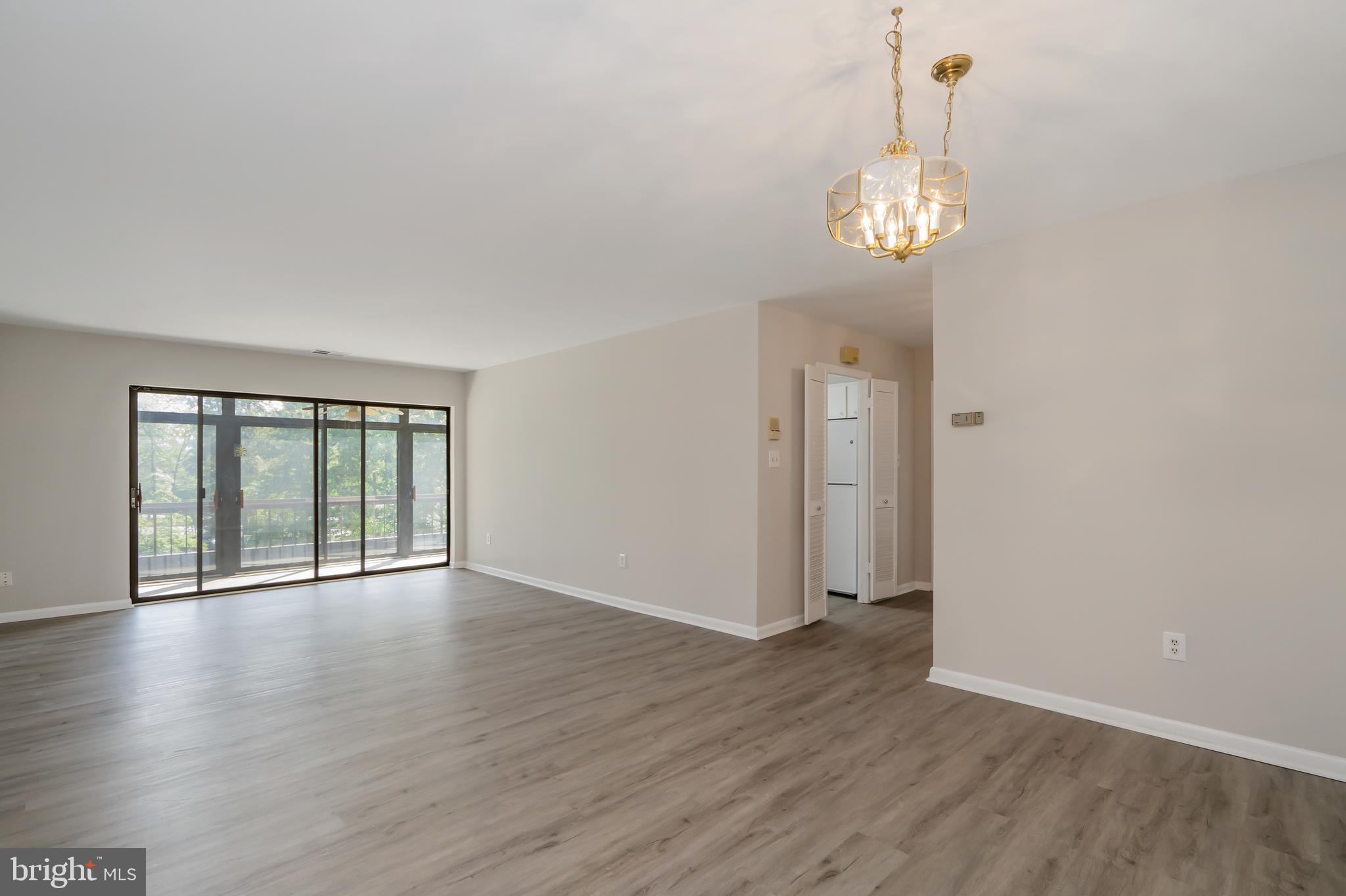 6300 Red Cedar Place, Unit 300 Baltimore, MD 21209 - Photo 10 of 36 Lots of Natural Light in the Open Space!