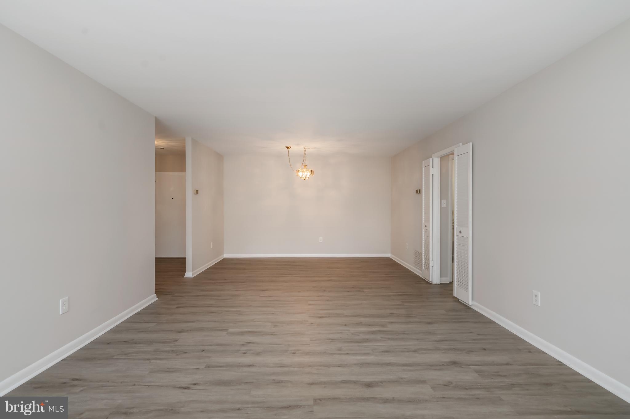 6300 Red Cedar Place, Unit 300 Baltimore, MD 21209 - Photo 12 of 36 Dining Room - Living Room Combo