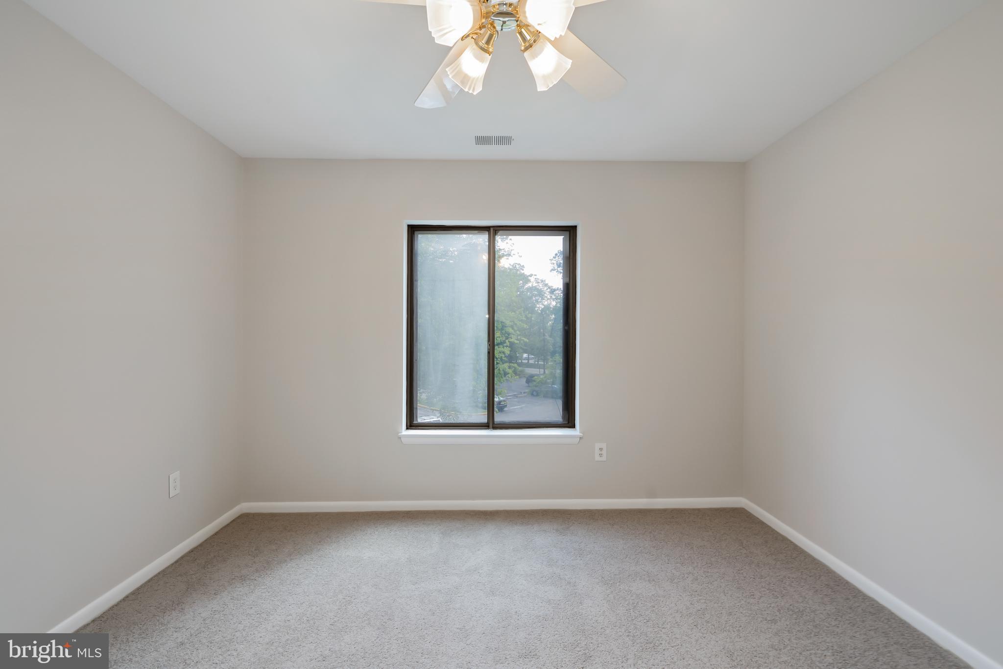 6300 Red Cedar Place, Unit 300 Baltimore, MD 21209 - Photo 24 of 36 Sun-Filled Additional Bedroom