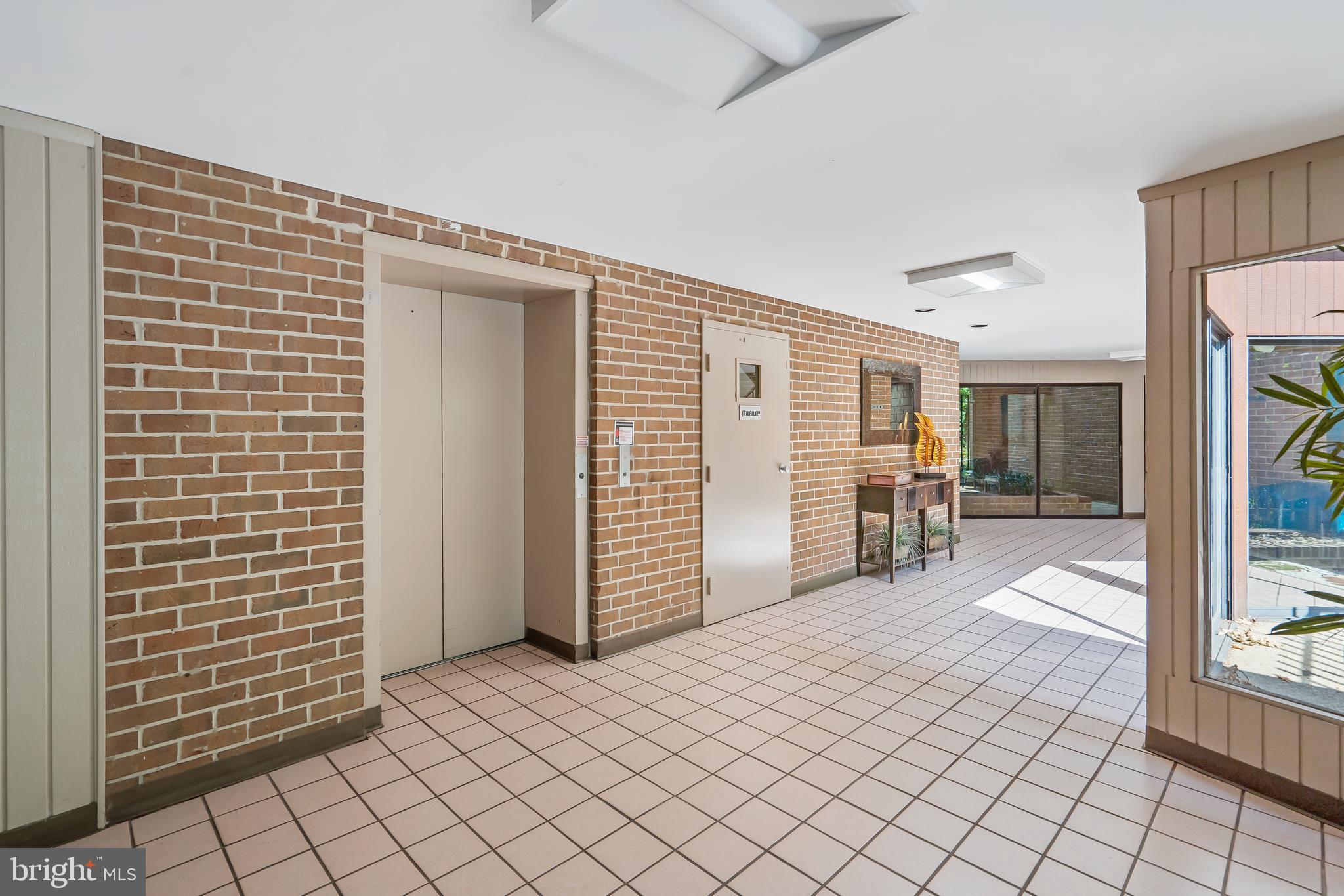 6300 Red Cedar Place, Unit 300 Baltimore, MD 21209 - Photo 6 of 36 Building Lobby With 24 Hour Security