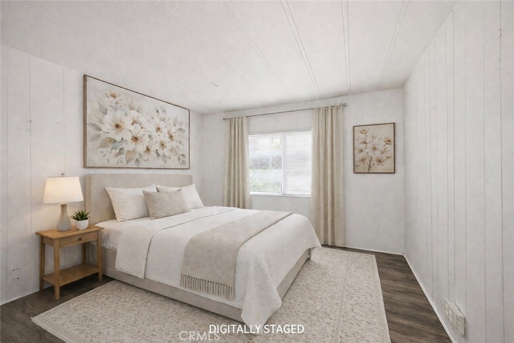 3795 Spring Valley Road Clearlake Oaks, CA 95423 - Photo 19 of 31 a bedroom with a large bed and a window