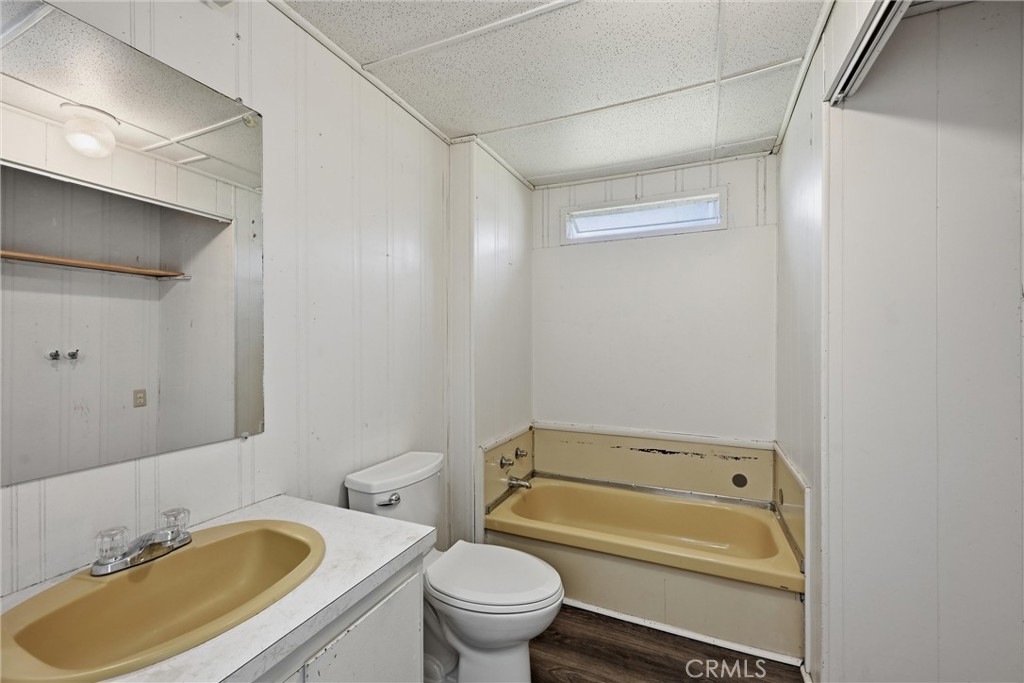 3795 Spring Valley Road Clearlake Oaks, CA 95423 - Photo 20 of 31 a bathroom with a sink toilet and bathtub