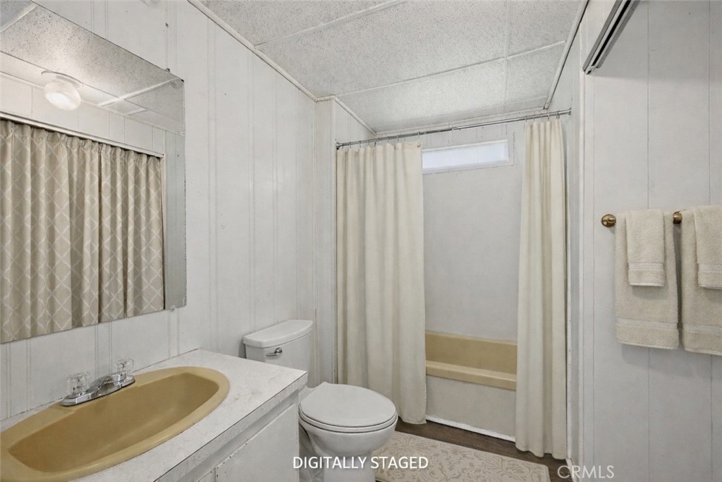 3795 Spring Valley Road Clearlake Oaks, CA 95423 - Photo 21 of 31 a bathroom with a sink toilet and shower