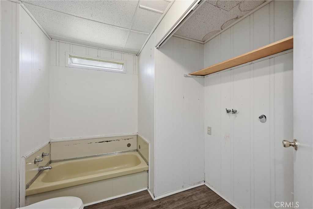 3795 Spring Valley Road Clearlake Oaks, CA 95423 - Photo 22 of 31 a bathroom with a tub and shower