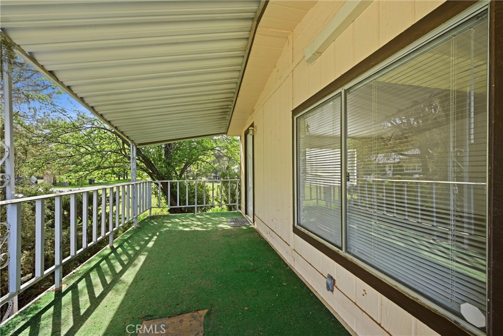 3795 Spring Valley Road Clearlake Oaks, CA 95423 - Photo 26 of 31 a view of a deck with a big yard