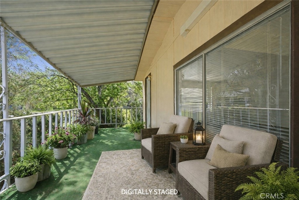 3795 Spring Valley Road Clearlake Oaks, CA 95423 - Photo 27 of 31 a view of a couches in the patio
