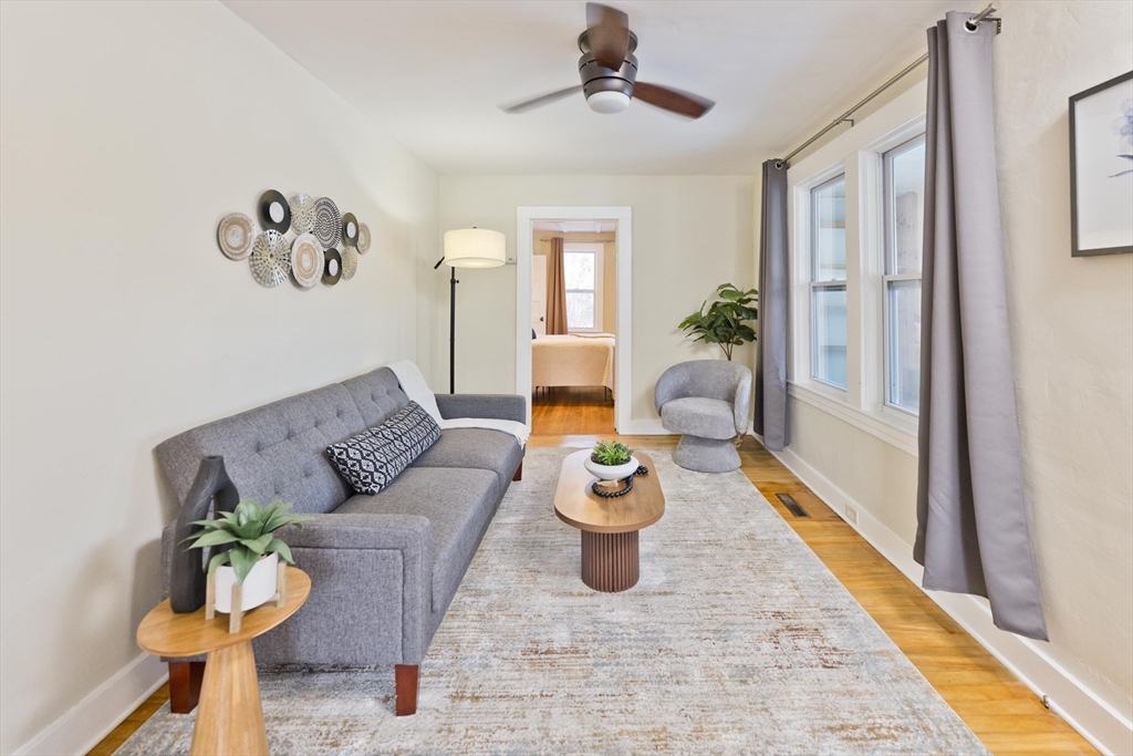 137 Old Amherst Road Belchertown, MA 01007 - Photo 11 of 42 a living room with furniture and wooden floor